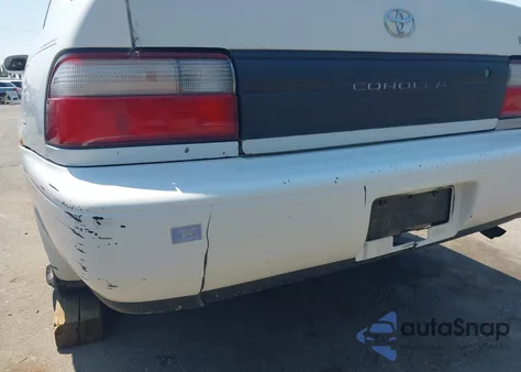 1996 Toyota Corolla Dx z USA, uszkodzony, nr VIN 1NXBB02E8TZ446904